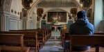 MAN PRAYING CHURCH