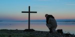 MAN PRAYING
