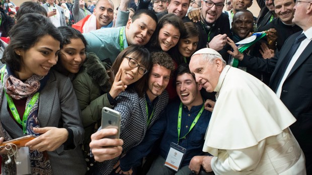 POPE FRANCIS GREETS YOUNG PEOPLE DURING A PRE-SYNODAL MEETING