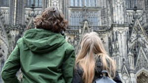 COUPLE IN FRONT OF CATHEDRAL