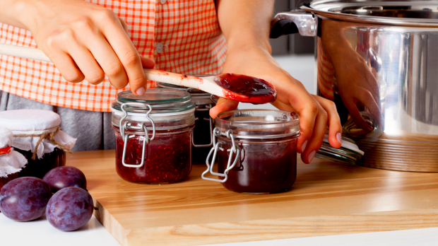 woman making fruit jam
