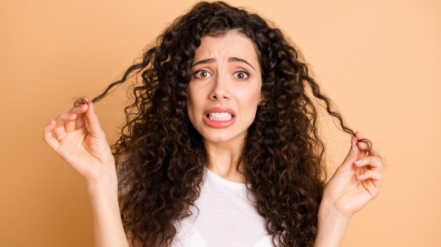 WEB3-WOMAN-HAIR-CURLS-HAIRSTYLE-SHUTTERSTOCK.jpg