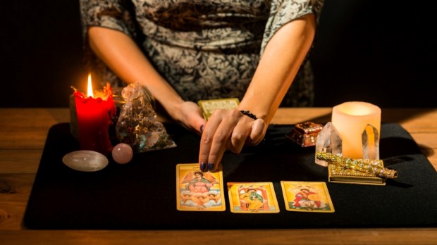 fortune teller with tarot cards