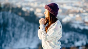 WINTER-WOMAN-PRAY-MOUNTAIN-shutterstock_579893440.jpg