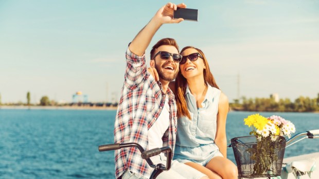 young couple making selfie