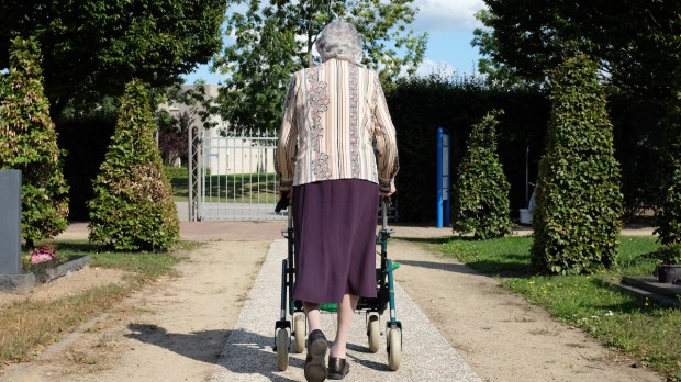 Elderly woman with walker